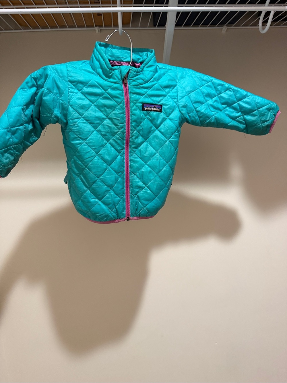 Patagonia Turquoise Quilted Jacket with Pink Trim